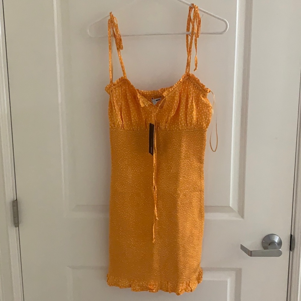 Smocked body con dress